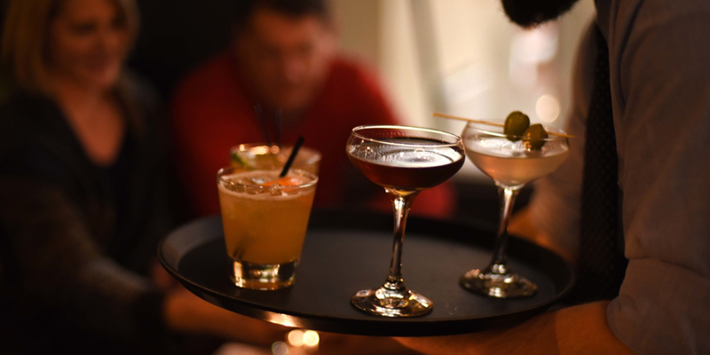 A tray of cocktails from Tom's Town Distilling Co.